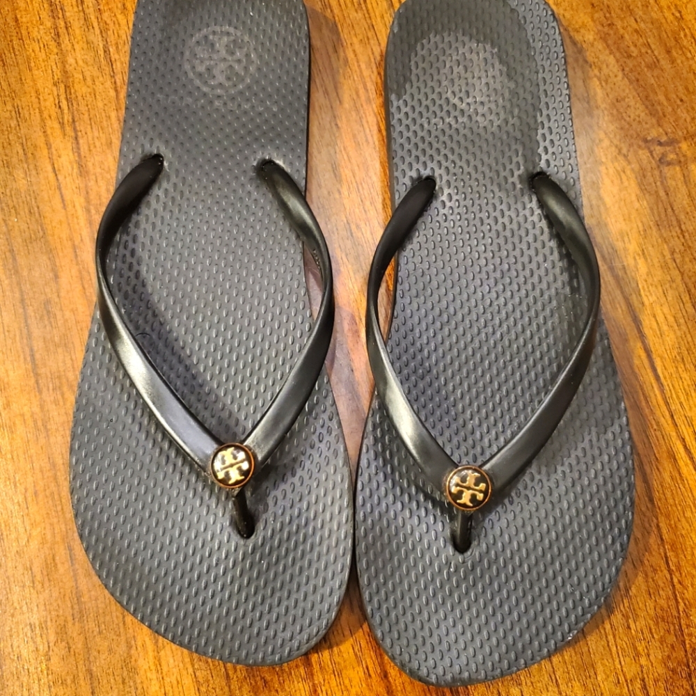 Tory Burch black flip flops. Size 7 to 7.5.